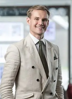 Porträtt av Dennis West